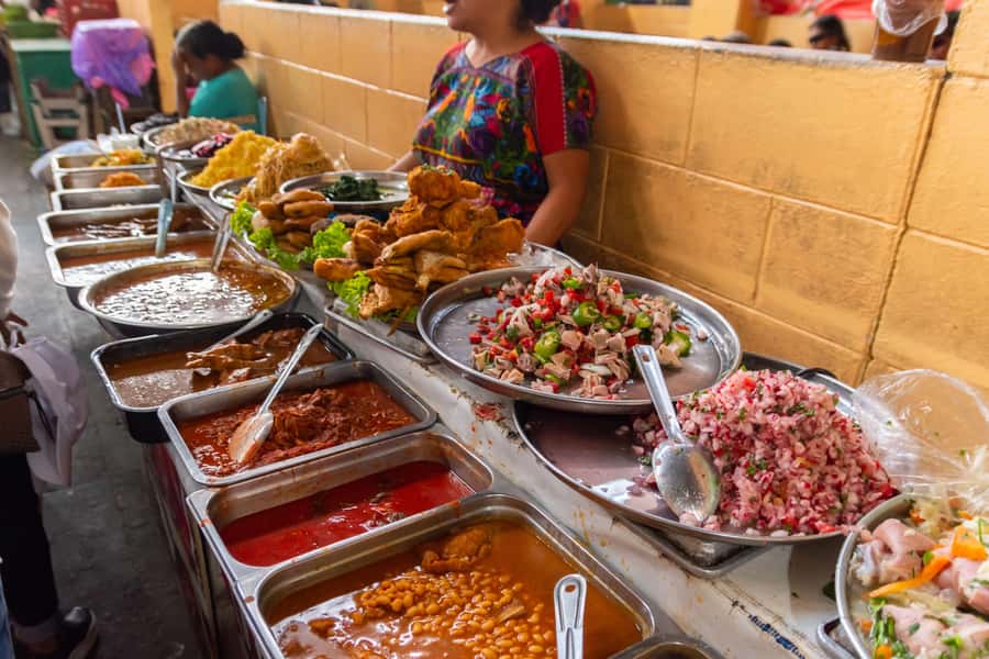 Antigua Guatemala: Street Food Walking Tour with Tastings - Antigua’s streets become part of the meal