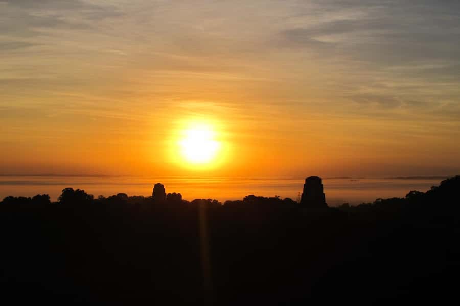 From Flores: Tikal Ruins Sunrise Guided Tour - Why Tikal before sunrise can be worth the lost sleep