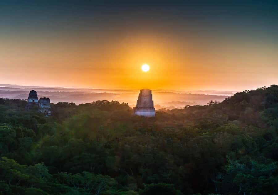 From Flores: Tikal Ruins Sunrise Guided Tour - The shared van ride to Tikal