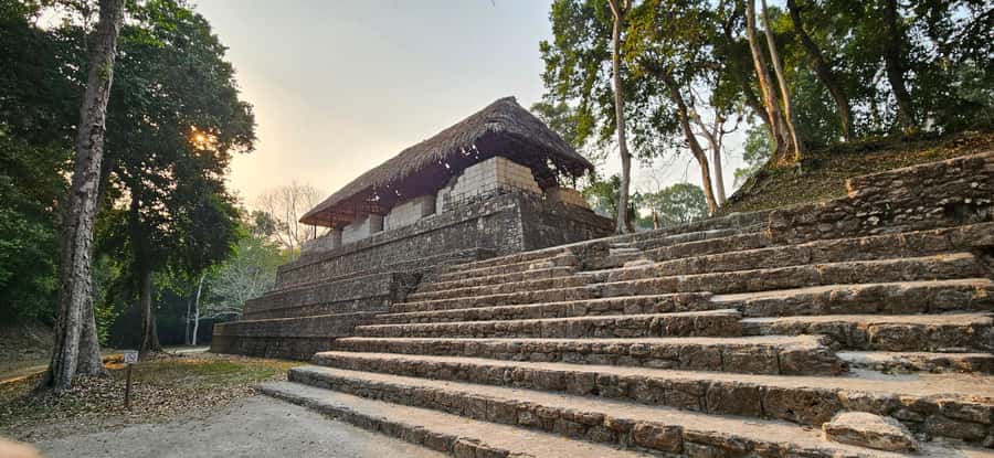 From Flores: Yaxha at Sunset Guided Tour - The plazas, causeways, and ball courts
