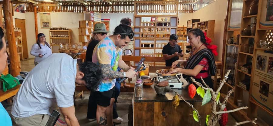Lake Atitlan Day Tour from Antigua or City | Boat & Villages - Turning cacao into chocolate