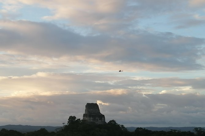 Tikal VIP Private Sunset Tour from Flores Guatemala - Walking through Tikal’s great Maya centers